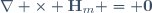 \nabla \times \mathbf{H}_m = \mathbf{0}