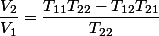 \dfrac{V_2}{V_1}=\dfrac{T_{11}T_{22}-T_{12}T_{21}}{T_{22}}