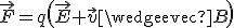 \vec{F}=q\(\vec{E}+\vec{v}\wedge\vec{B}\)